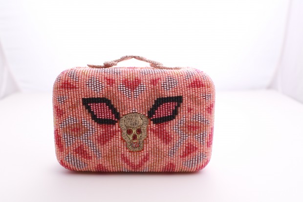 Everybody's Carrying: House of Harlow beaded “Marley” clutch, $450, available at Ivy Hill